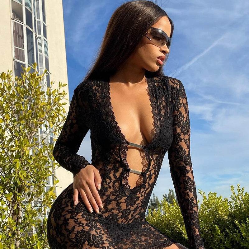 Sexy Woman in a See Through Lace Mini Dress